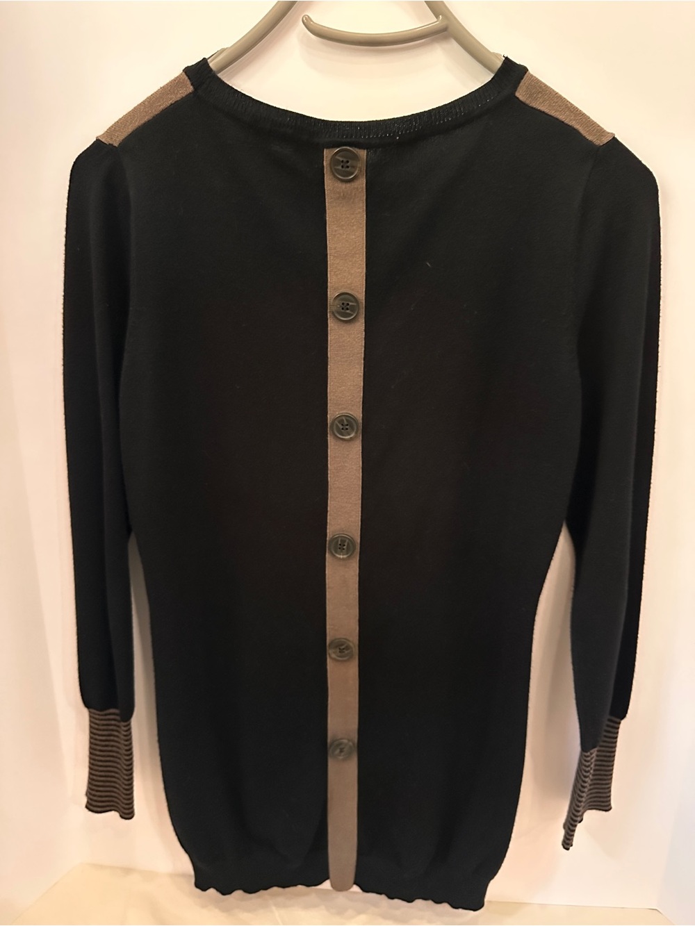 One A Black Sweater with Tan Trim and Button-Back Detail